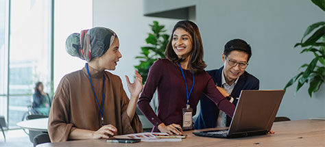 Group Of People Smiling In The Office